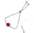 Armband mit Glasperle in rot, silber