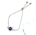 Armband mit Glasperle in lila, silber