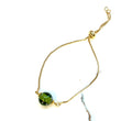 Armband mit Glasperle in grün, gold